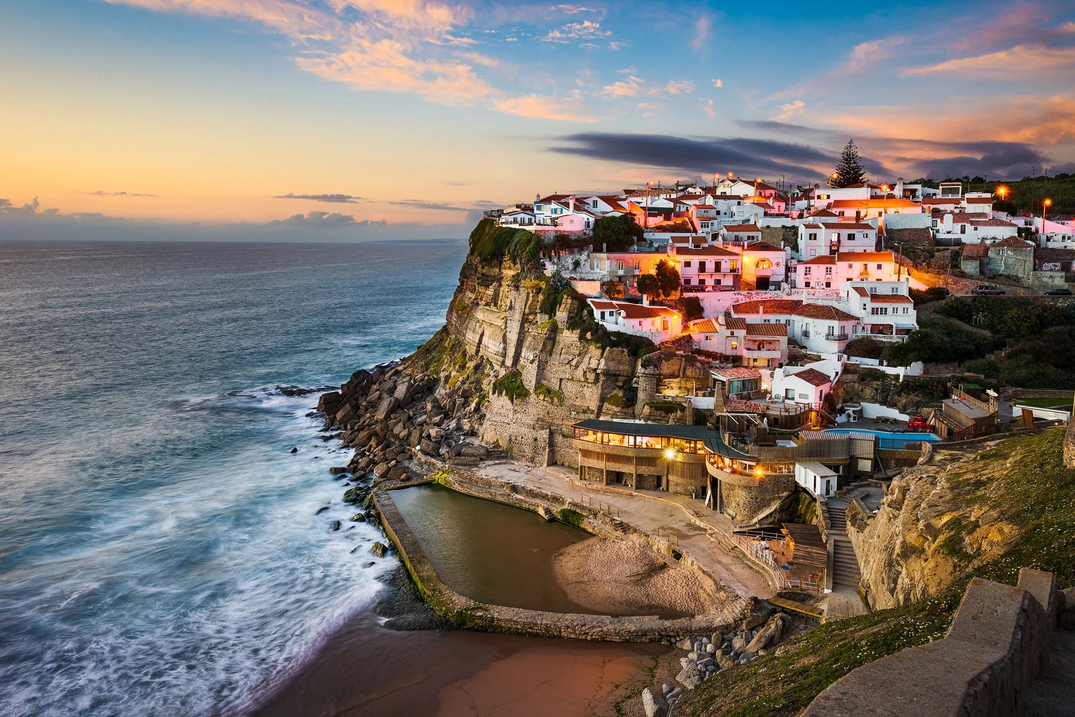 Azenhas do Mar is a great photo spot to shoot the sunset near Sintra
