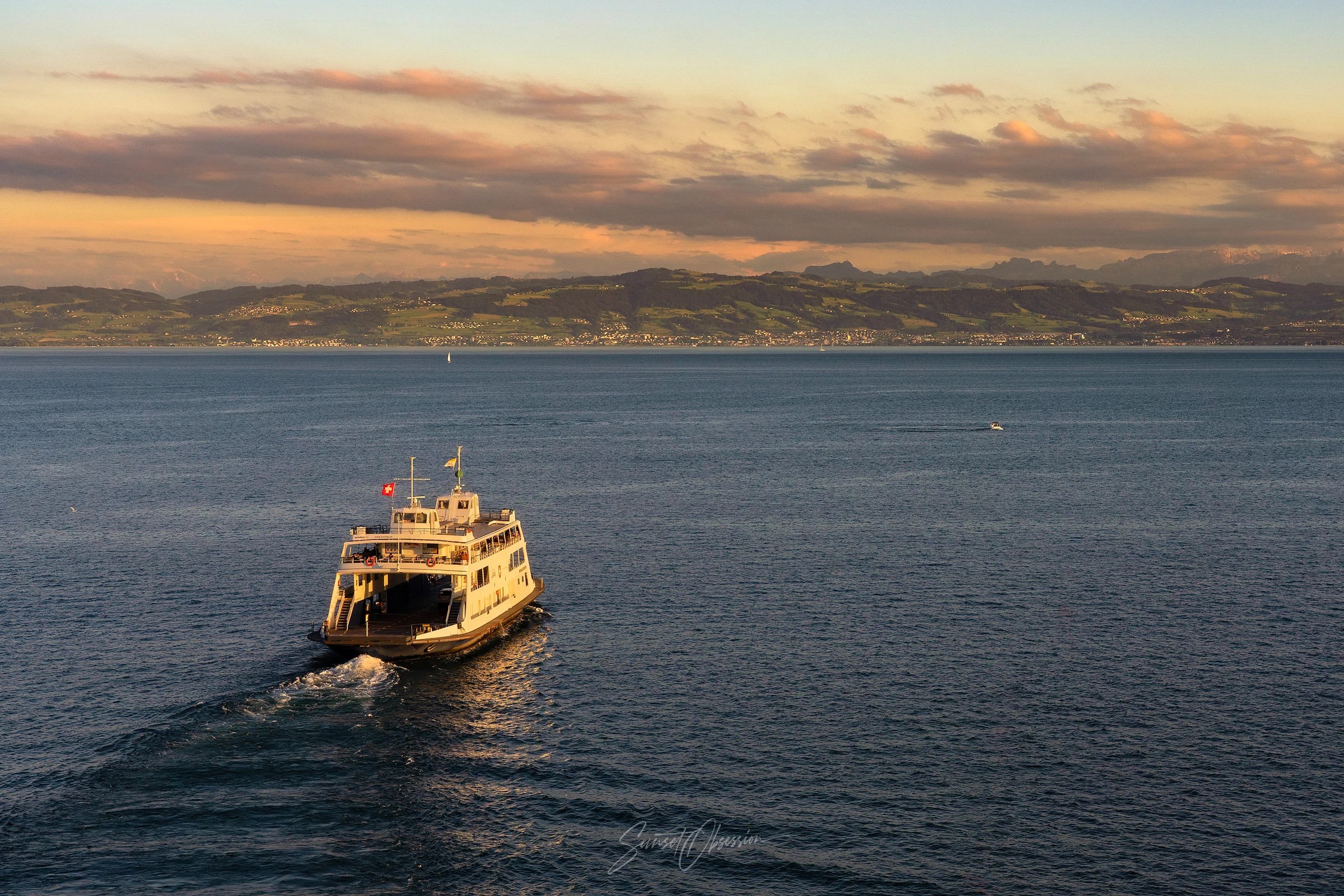 A ferry departing from Friedrichshafen towards Switzerland on Bodensee