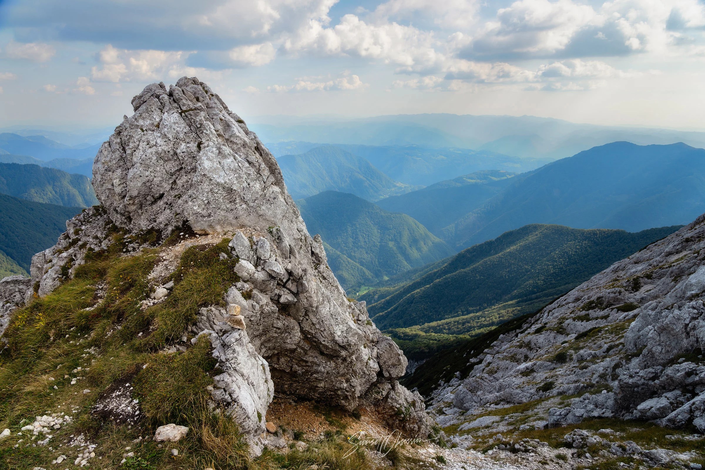 Light hitting the distant valley on the hike back from Vogel summit