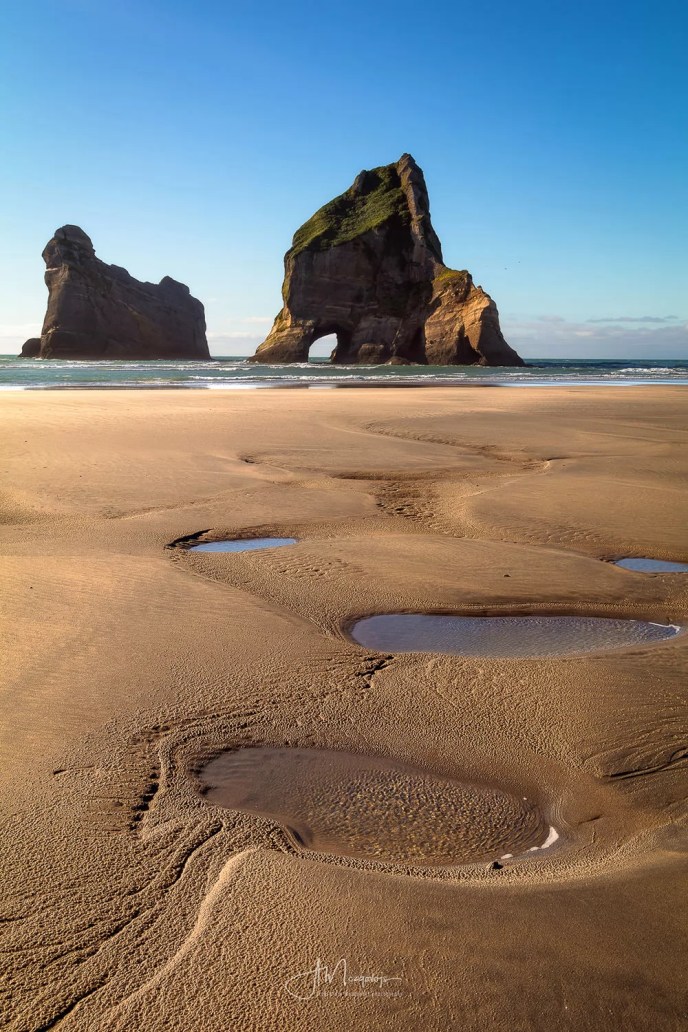 My attempt at using patterns in the sand as leading lines towards the Archway Islands