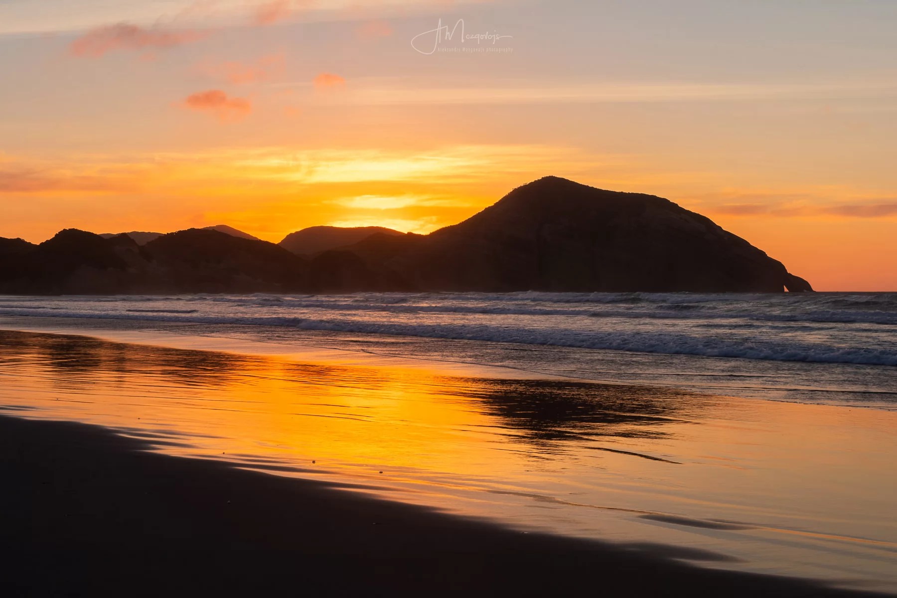 Sunset over Wharariki Beach, New Zealand